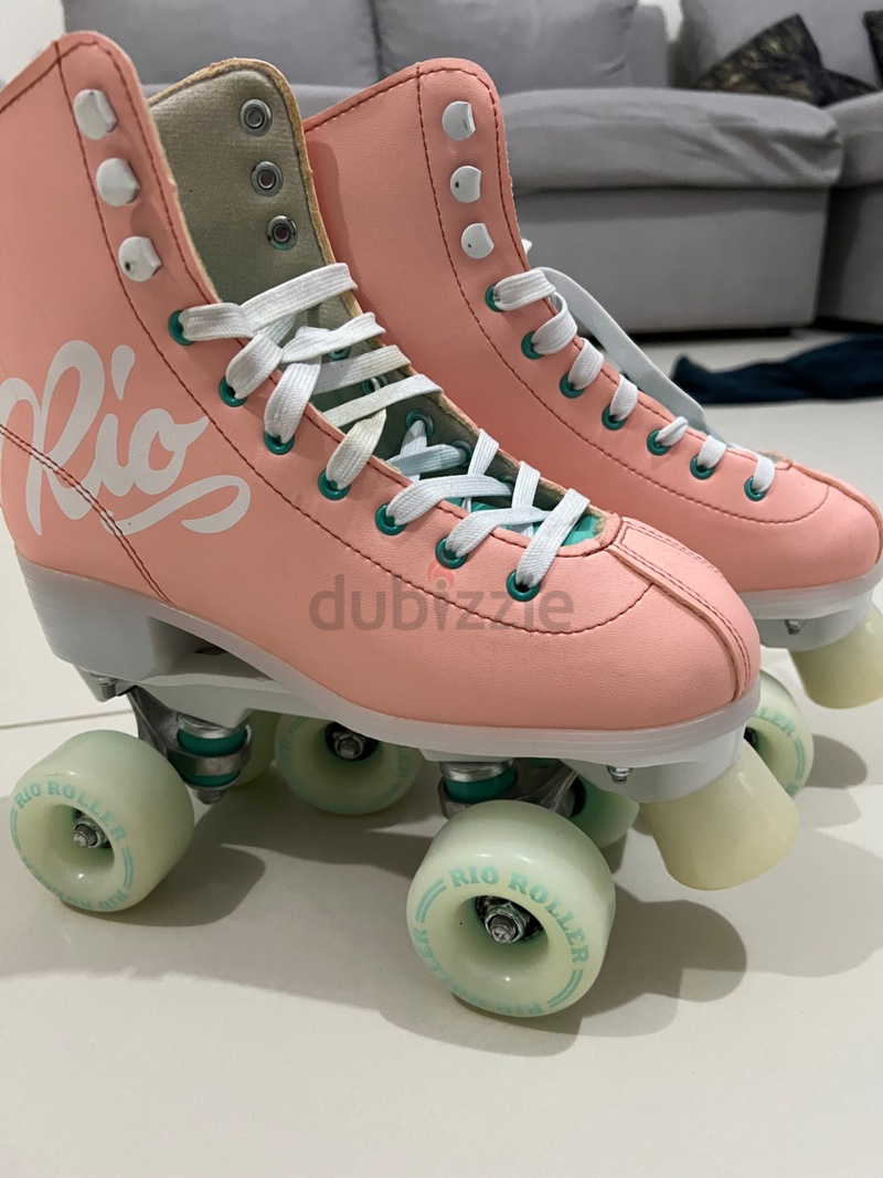 Roller quad RIO ROLLER Script Peach/Green | OZFLIP