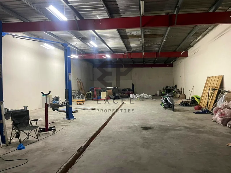 Warehouse Functional Auto garage Near Main Road Attached Amenities