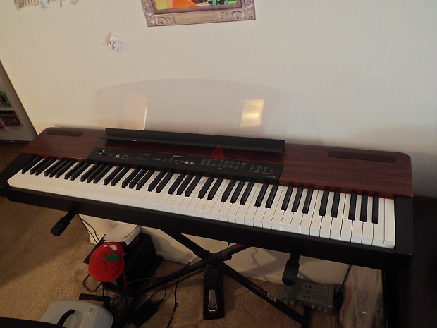 Yamaha P120 Piano with mettallic stand and sustain pedal. | dubizzle