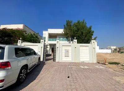 For Rent In Ajman, Al Rawda Area, Two-storey Villa With Central Air Conditioning