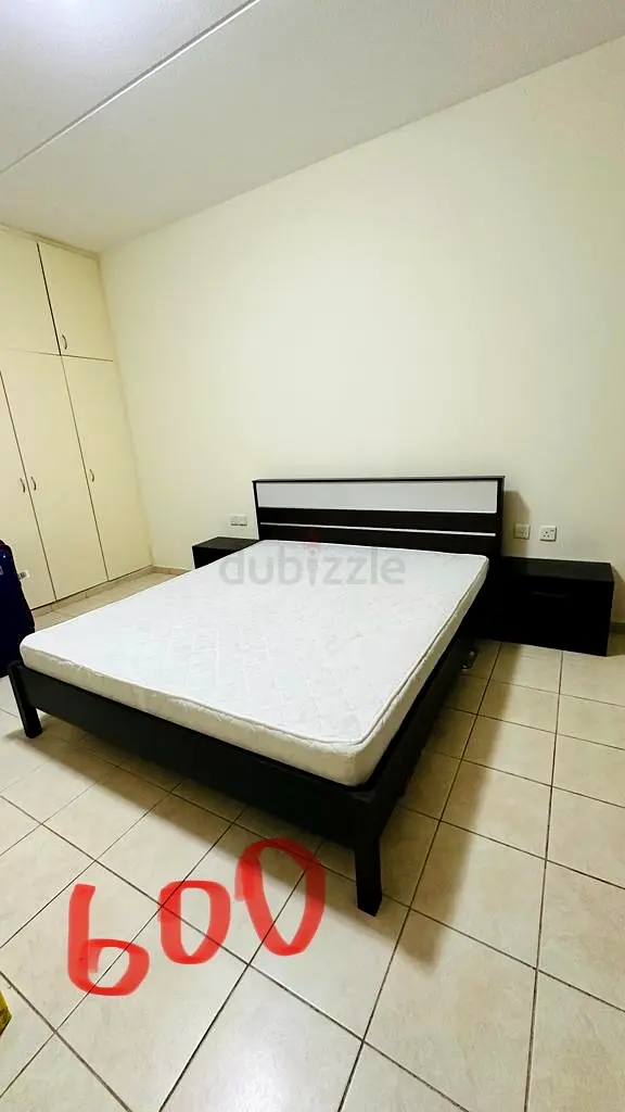 Queen sized bed cot and two side tables