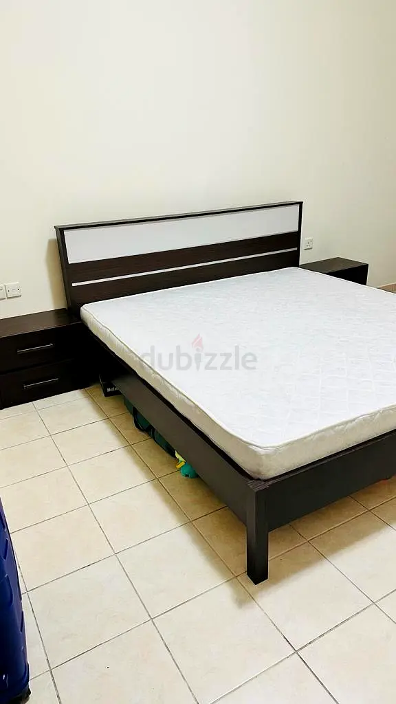 Queen sized bed cot and two side tables