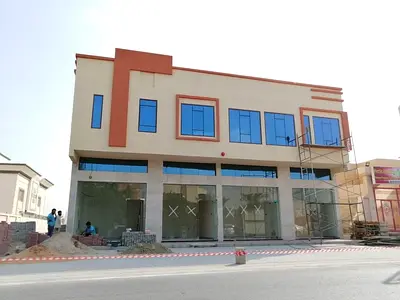 A New Building For Sale In Ajman Building, Residential And Commercial, With An Annual Income, Freeh