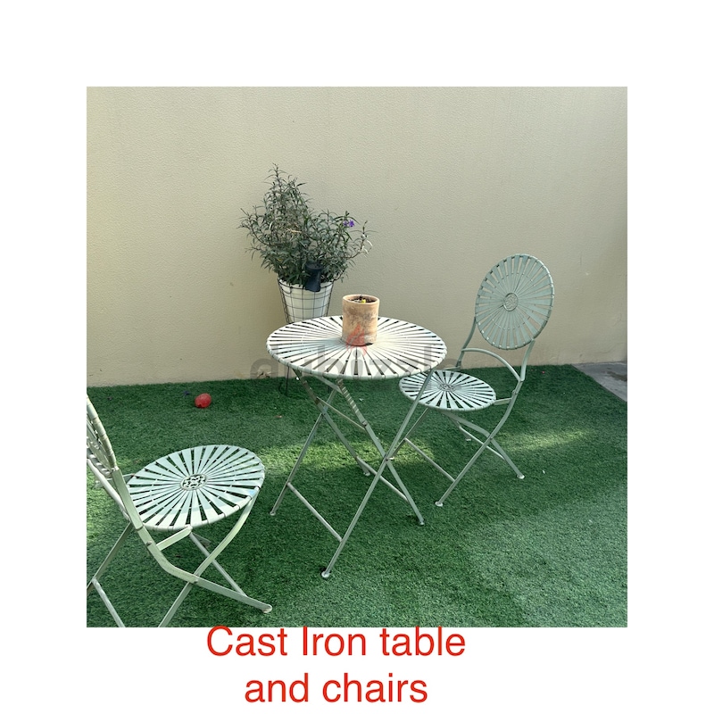 Metal garden table on sale and chairs