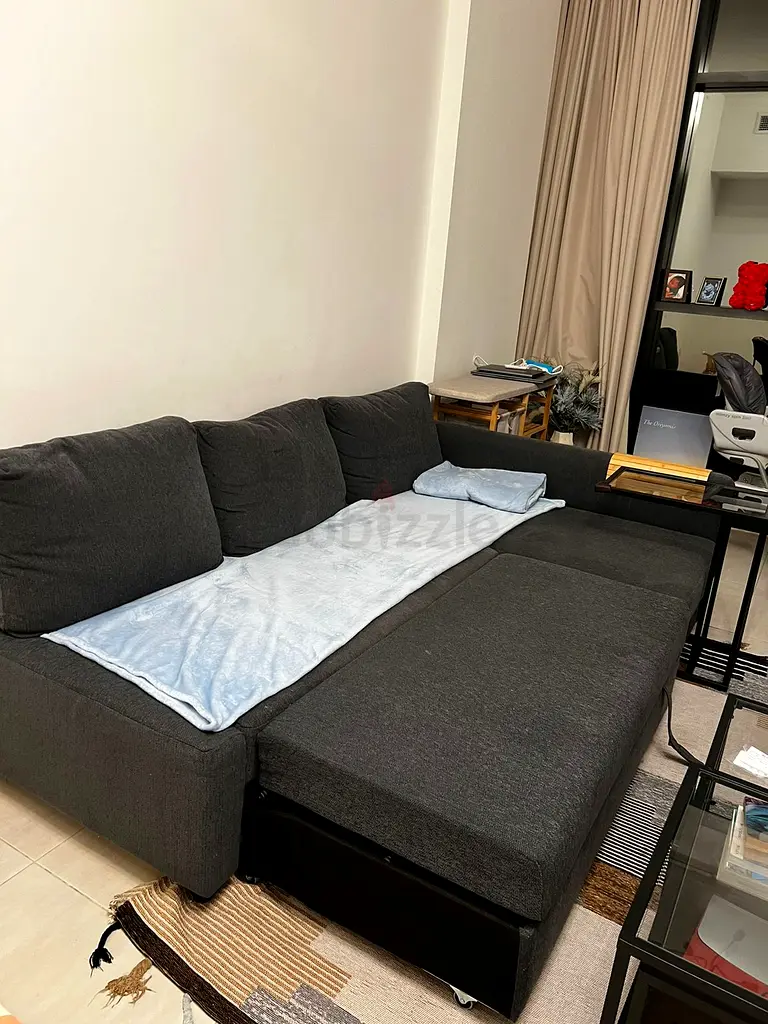 IKEA L shape sofa in good condition 4 seater bed design with storage