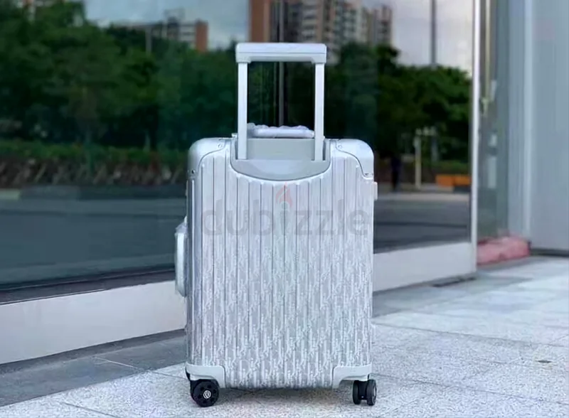 حقيبة سفر يدويّة من ديور وريمووا، باللون الفضي63233128599810113