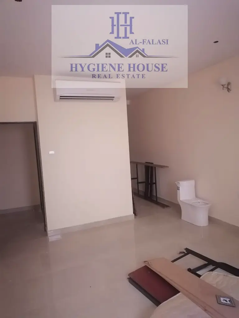 Apartment/Flat A room and a hall for rent in Al Rashidiya 2