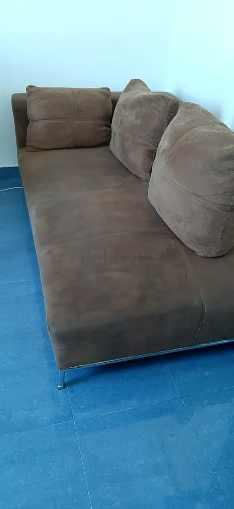 Homes R US brown sofa