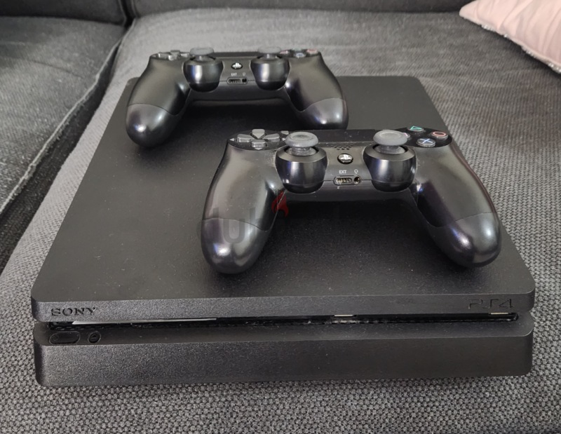 PS4 slim 1 TB with 2 controllers | dubizzle