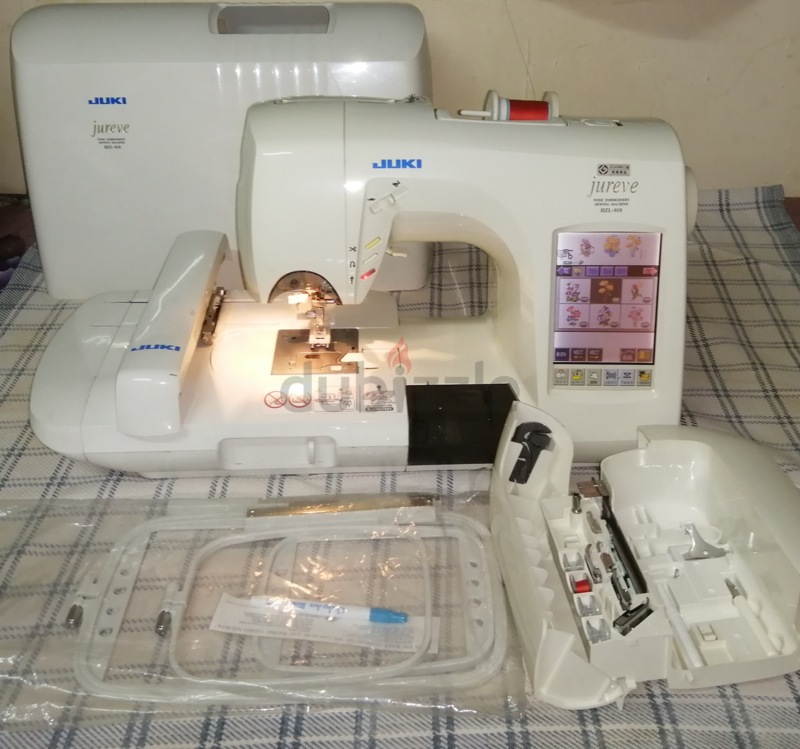 Juki Hzl-010 sewing machine with embroidery kit | dubizzle