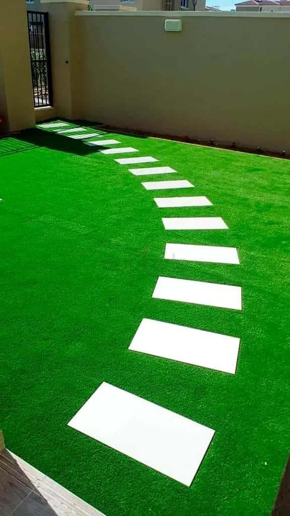 Artificial grass and natural grass