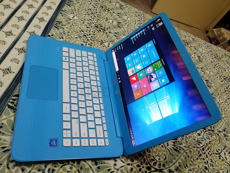 حاسوب محمول HP 14-ax010wm ستريمنبوك بحجم شاشة 14 بوصة بدقة HD ومعالج سيلرون N3060 بسرعة 1.6 جيجاهرتز وذاكرة وصول عشوائي بسعة 4 جيجابايت وذاكرة داخلية 32 جيجابايت من نوع eMMC ونظام تشغيل ويندوز 1063255537382145114