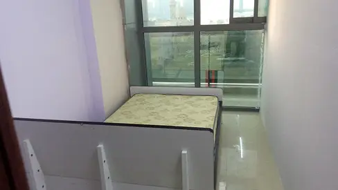PARTITION ROOM FULL CLOSED/FURNISHED WITH WINDOW FOR RENT IN MAJAZ 02 BUHAIRAH CORNICHE CITY CENTER