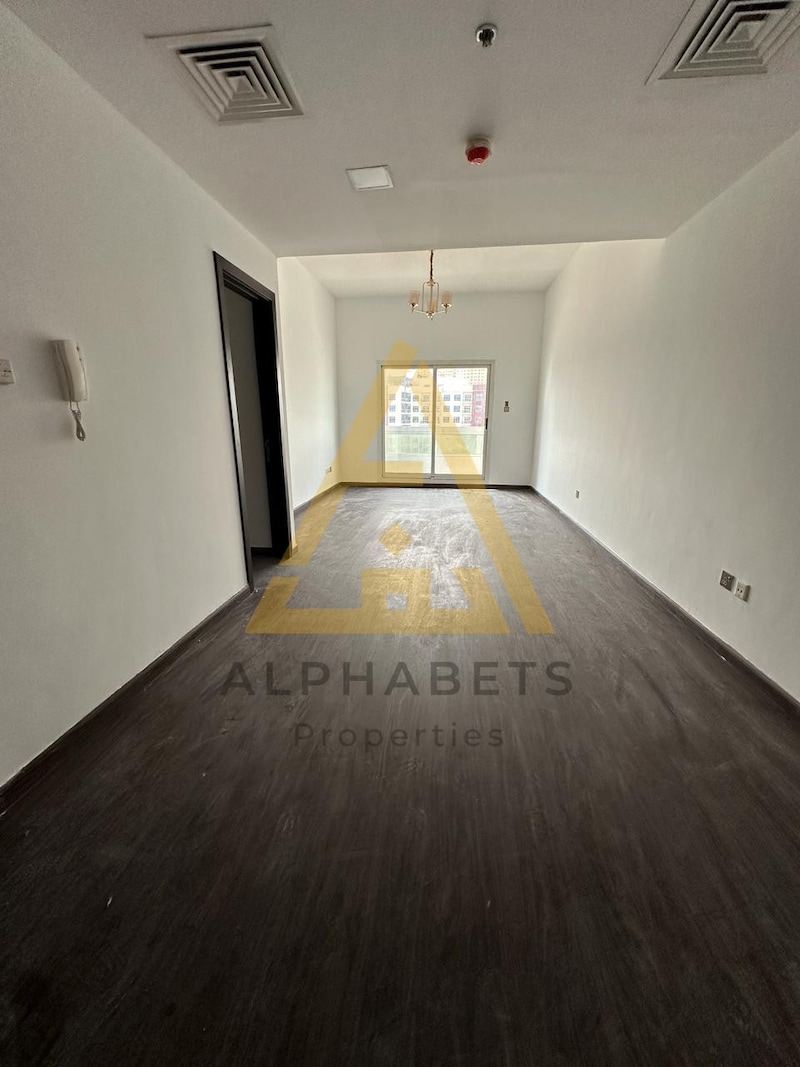 SPACIOUS 1 BEDROOM APARTMENT IN FRONT OF SOUQ EXTRA