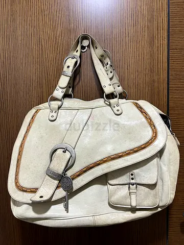 Dior saddle gauncho bag