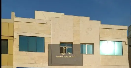 Building In Al Yarmok Area \ Sharjah For Sale Great Location . Commercial Covered With Natural Ston