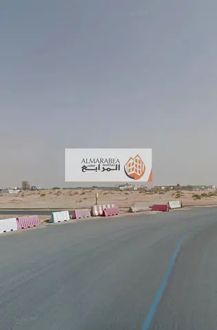 For Sale Land In Sajaa S Industrial, A Special Location, A Car Wash Permit