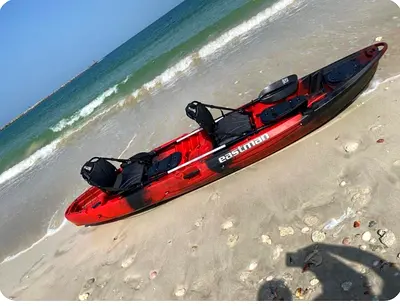 Three seat kayak with chairs and paddle