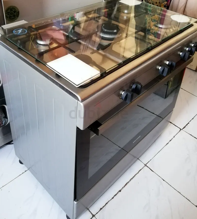 Cooking range five burner