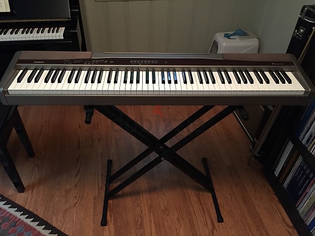 Casio privia px100 with mettallic stand and sustain pedal. Perfect