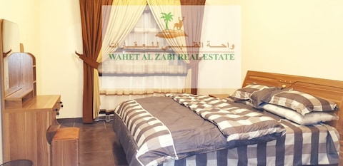For Rent In Ajman, A Furnished Apartment With One Room And A Hall, Close To Safeer Mall, Khalifa St