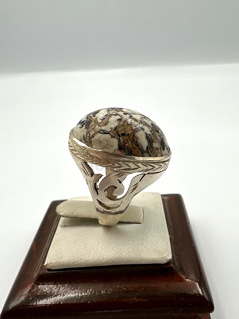 A ring with a turquoise stone, Neyshabur rare63174324195331114