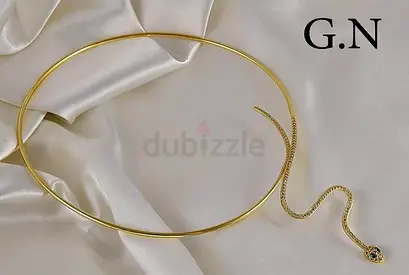 كوليه نسائي مطلي ذهب. فصوص حجر زيرقون Womens collier is gold plated. Stone lobes Zirqon