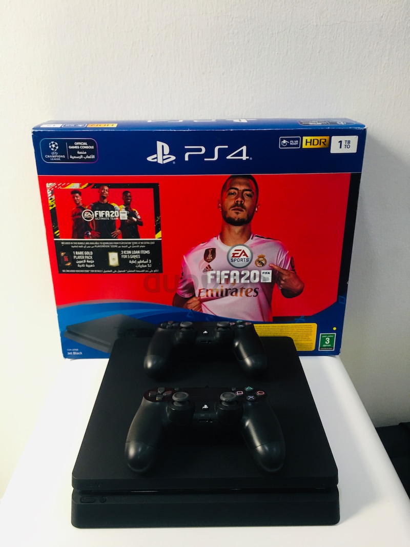 PS4 Slim 1Tb With 2 Controllers Plus 4 Games | dubizzle