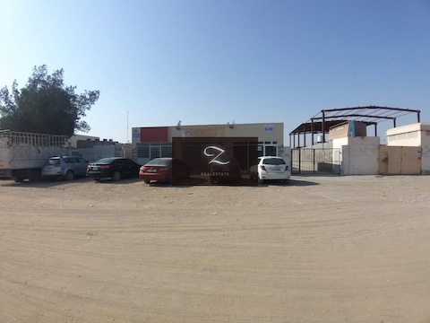 For Sale Walled Land In Sharjah / Sajaa An Excellent Location On A Street 24 Meters Wide