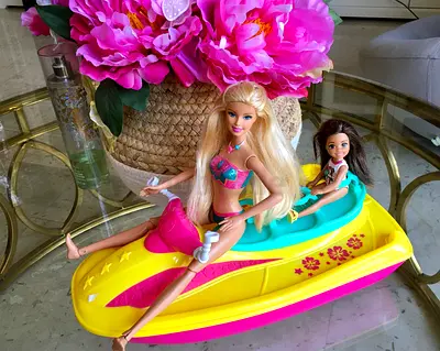 Barbie and little sister on jet ski
