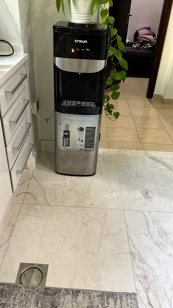 Bottom mount water dispenser