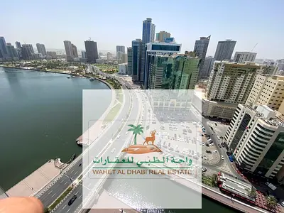 Directly On Al Qasba Canal,a Two-bedroom Apartment,a Lounge And Maids Room With A Gym,swimming Poo