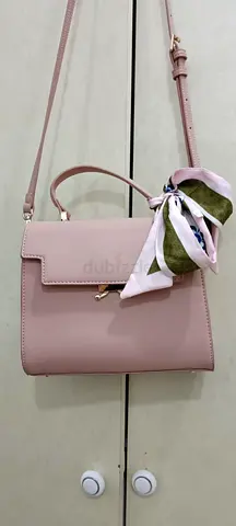 Very clean pink leather bag