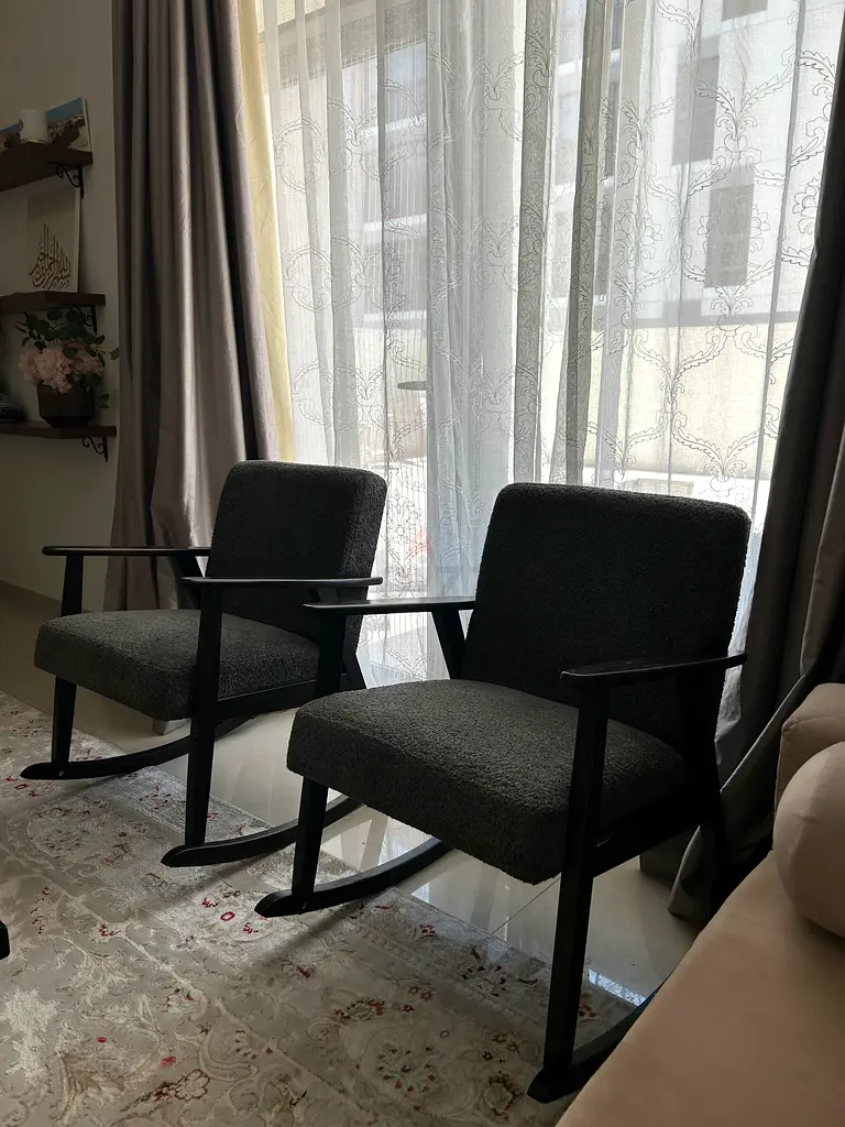 Two rocking arm chairs