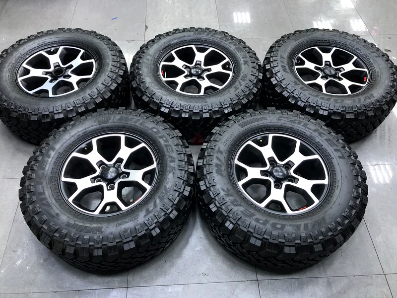 5x original Jeep Rubicon Rims size 17” 5x127 with 285/70R17 Falken MT