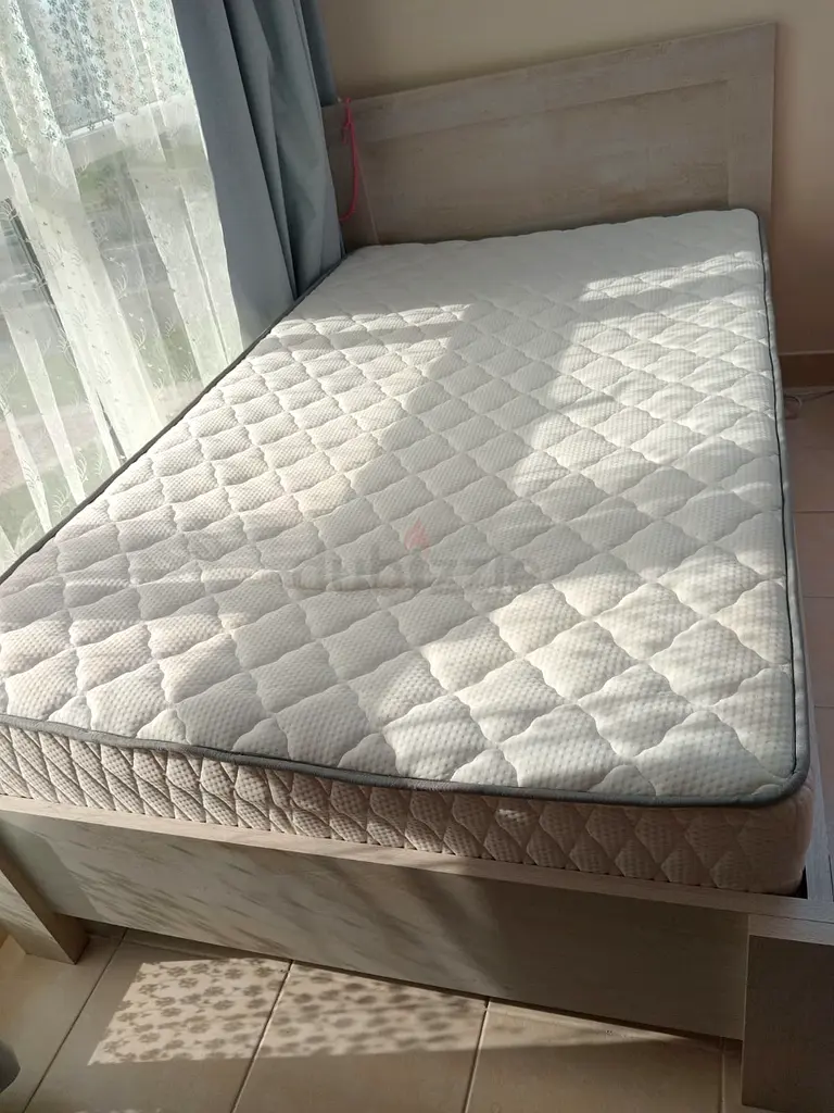 Bed with mattress
