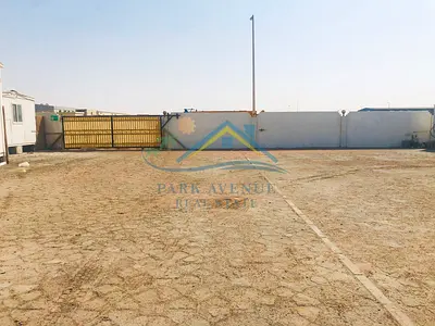 5000 SQMTRS LAND WITH BOUNDARY WALL