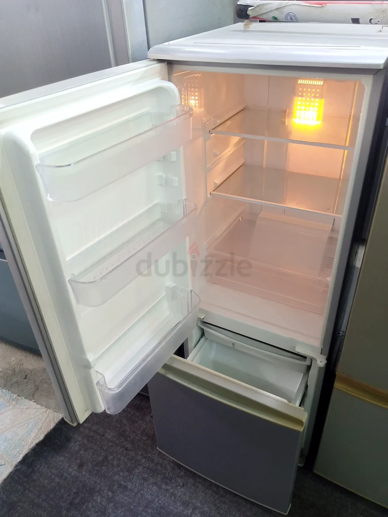 Small size fridge available with free home delivery.