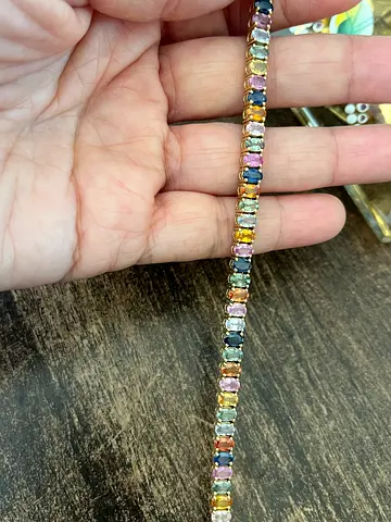 Rainbow sapphire in 18k gold tennis bracelet