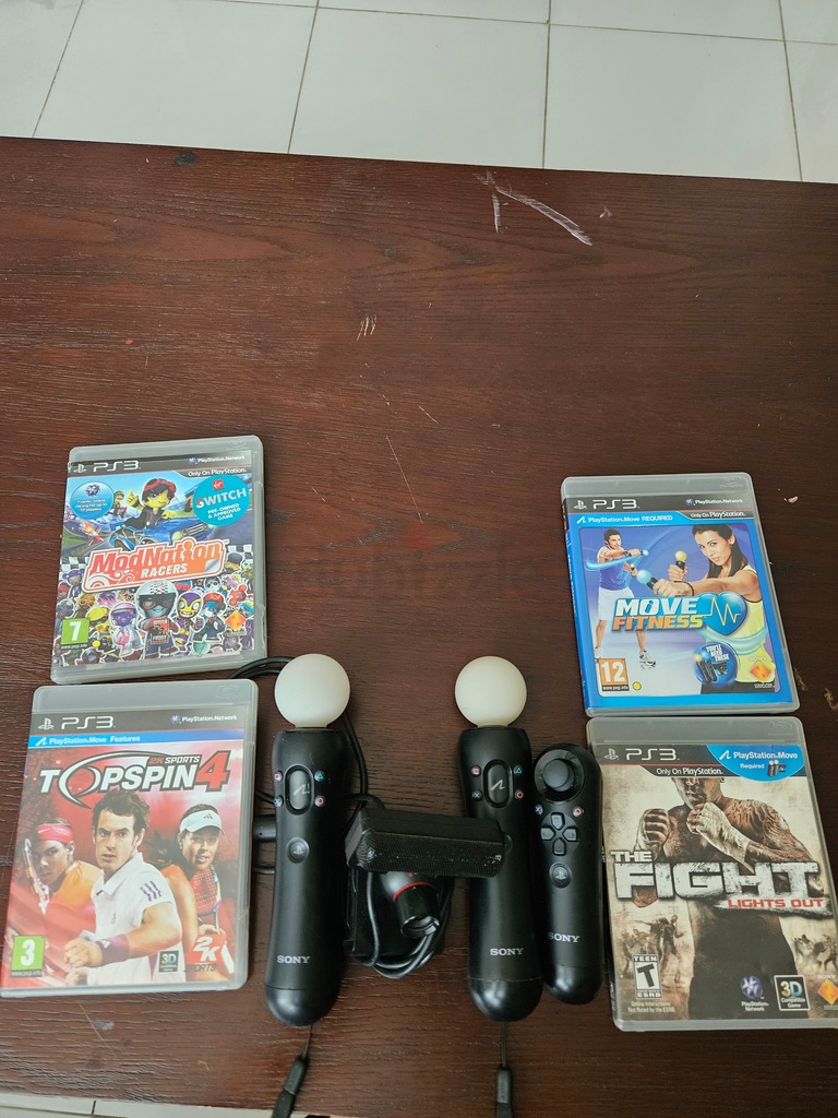 Ps move controller navigator camera and 4 games | dubizzle