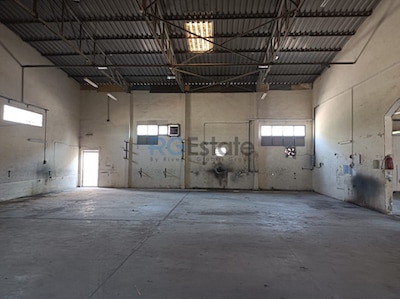 Strategic Investment: Rented 10,000 Sqft Warehouse With Office For Sale In Al Qusais, Offering A 7.