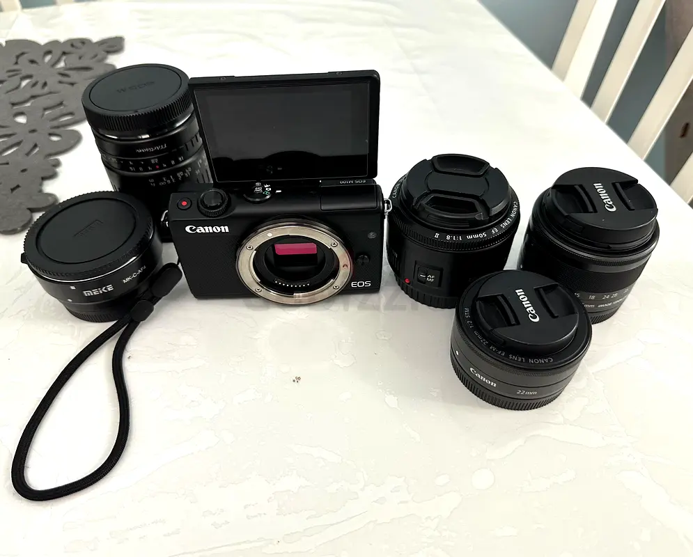 Canon m100 withe 4 lens