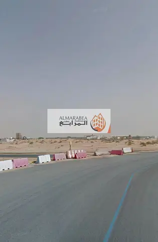 For Sale Land In Sajaa S Industrial, A Special Location, A Car Wash Permit