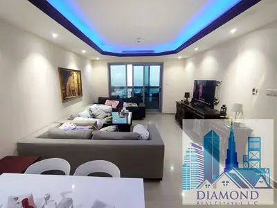 For Sale, A One-bedroom Apartment With A Living Room, Sea View, Corniche Tower, Ajman.
