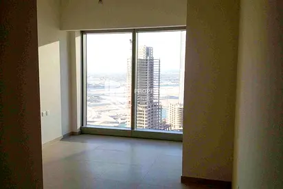 Partial Canal View | Laundry Room | High Floor