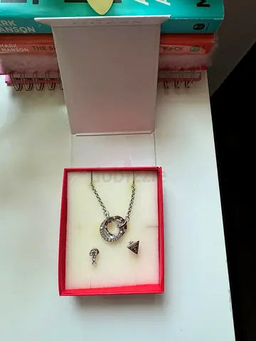 guess set Bracelet (adjustable) and Earrings