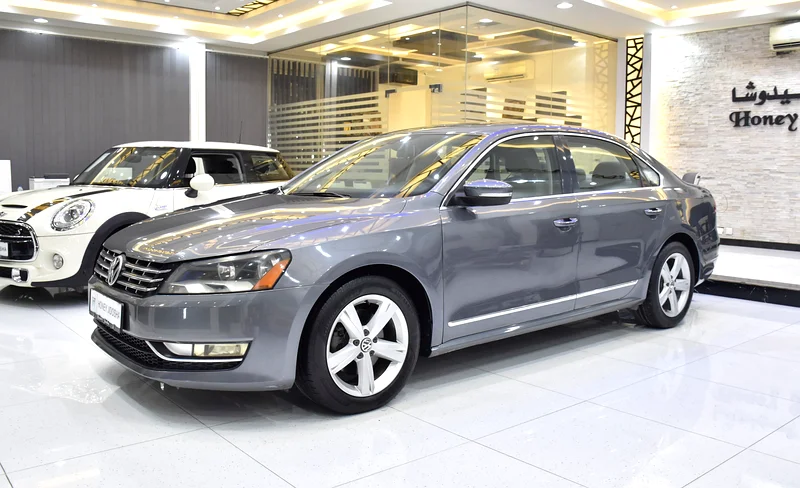 EXCELLENT DEAL for our Volkswagen Passat ( 2013 Model ) in Silver / Grey Color GCC Specs63170385386882111