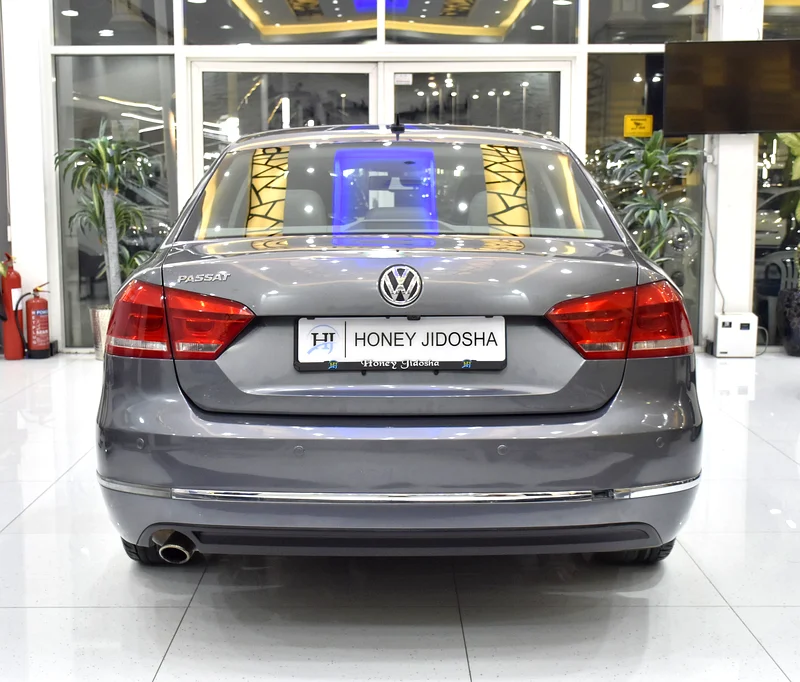 EXCELLENT DEAL for our Volkswagen Passat ( 2013 Model ) in Silver / Grey Color GCC Specs63170385386882114