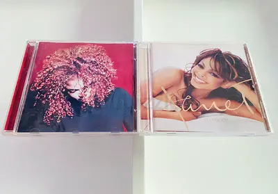 2 Janet Jackson Music CD’s