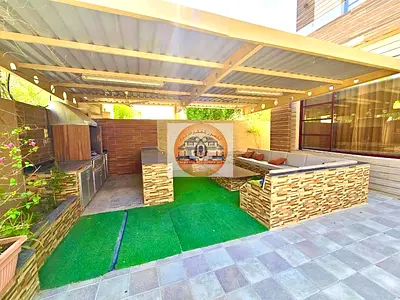 Villa For Sale In Ajman, Al Rawda Area, Two Floors, Stone Facade, Modern Design, With Electricity,